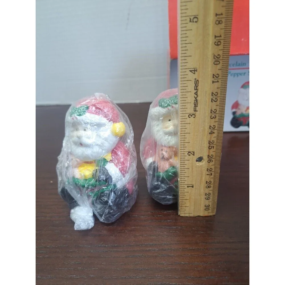 Set Of Porcelain Santa Salt And Pepper Shakers